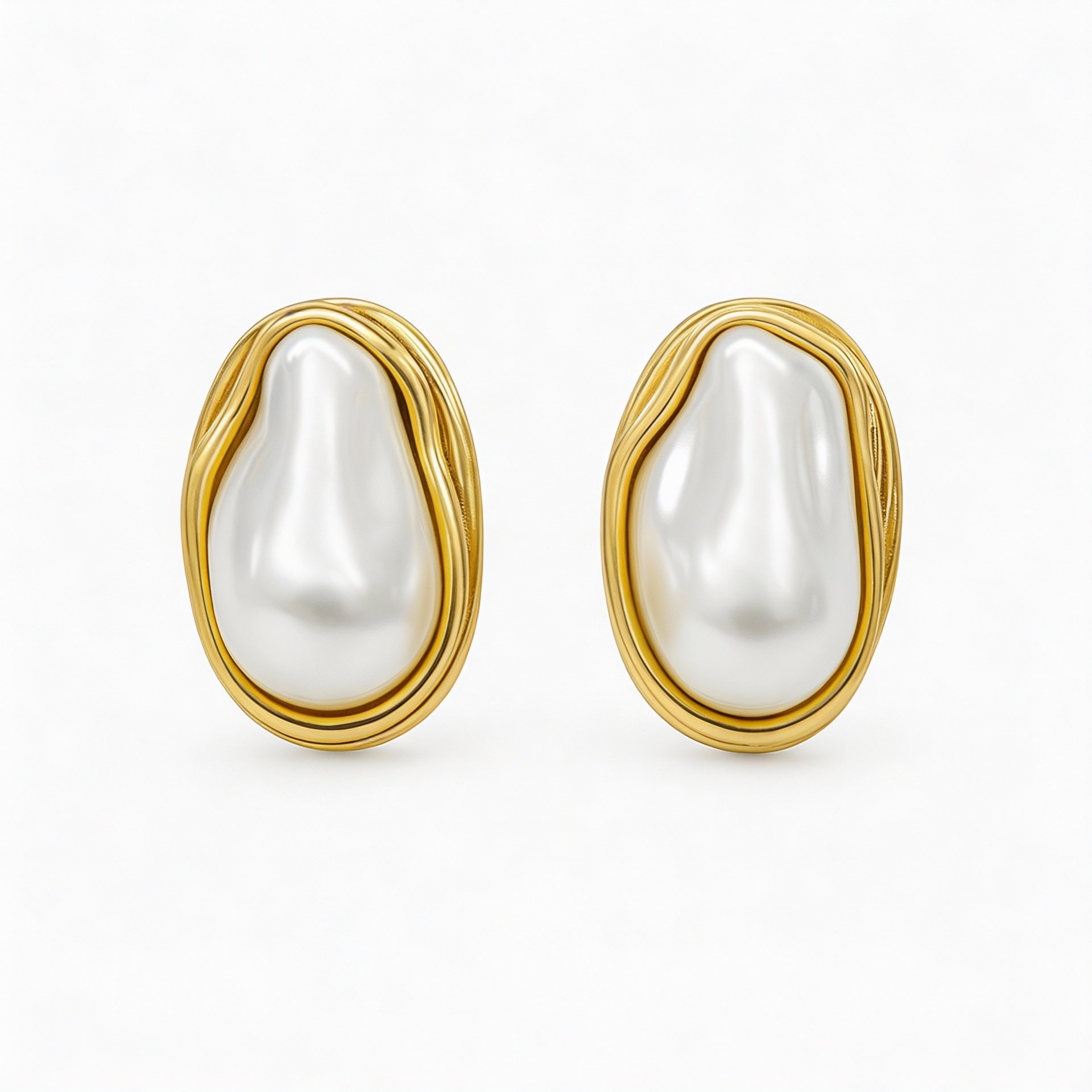Sculptural Pearl Earrings in a Gold Frame