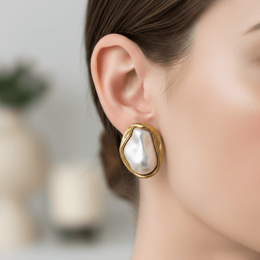 Sculptural Pearl Earrings in a Gold Frame
