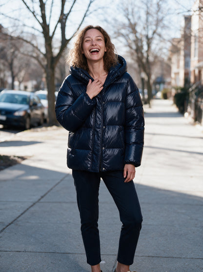 Livia navy puffer jacket worn on a winter sidewalk