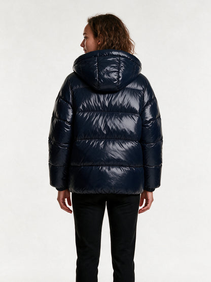 Back view of the Livia navy puffer jacket showing the hood and horizontal baffles