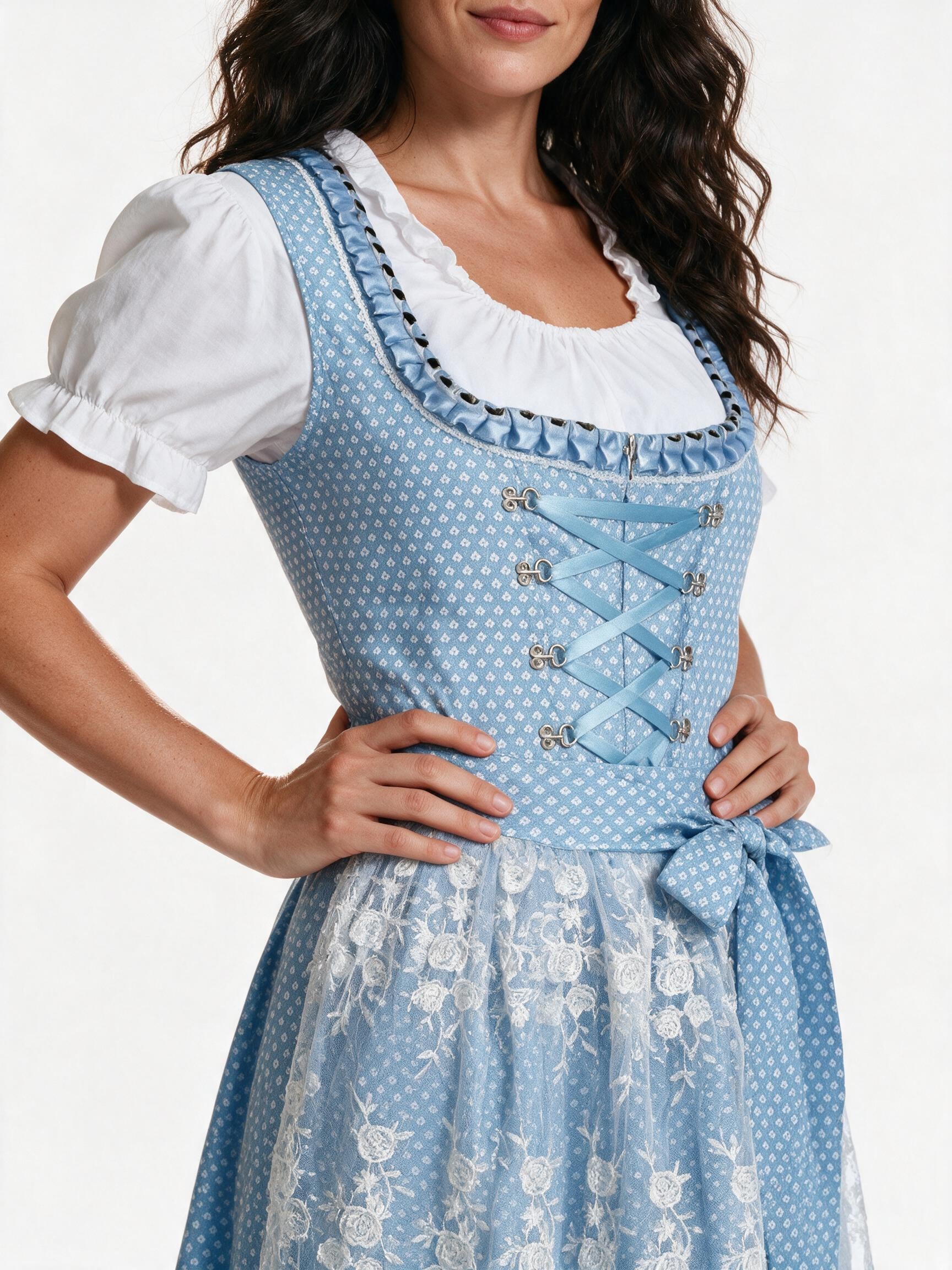 Close detail of the silver hook lacing and floral lace overlay apron