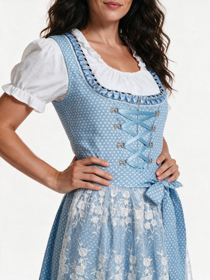Close detail of the silver hook lacing and floral lace overlay apron