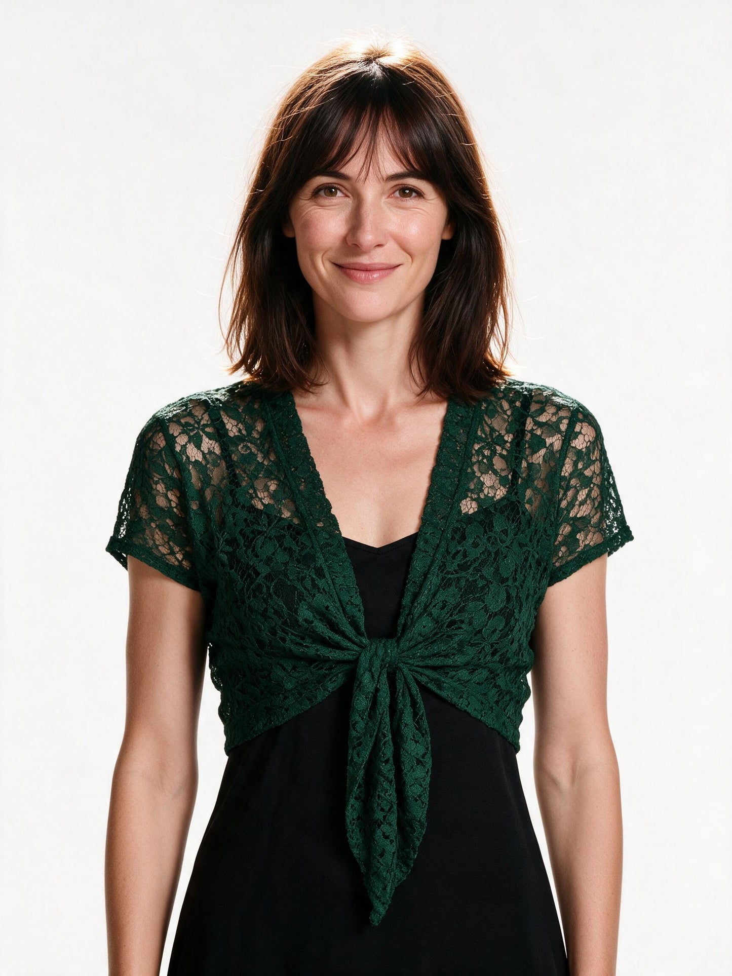 Dark green lace tie-front bolero shrug, short sleeve cropped cardigan, white background