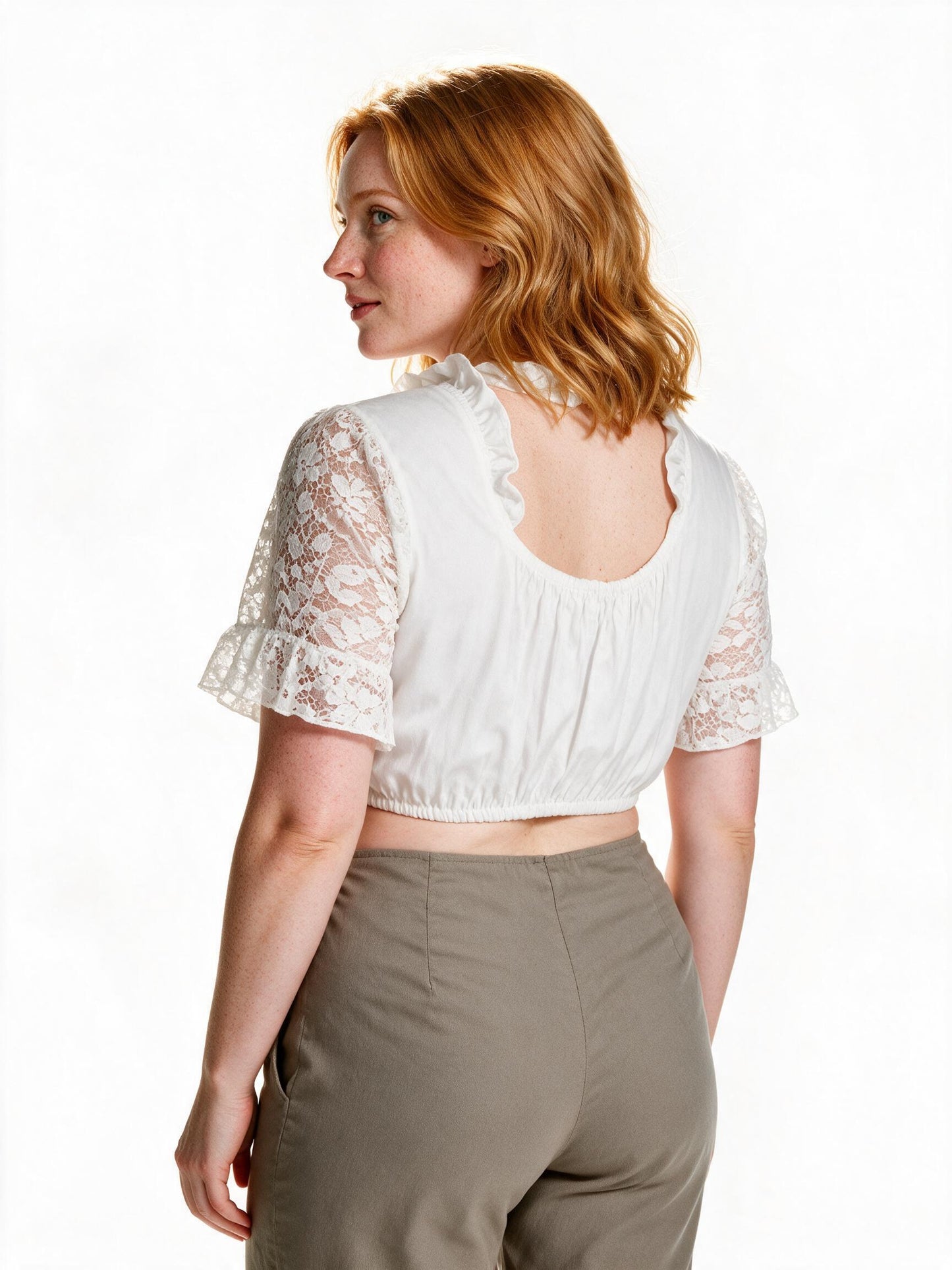 Cropped white lace dirndl blouse, back view showing the gathered panel
