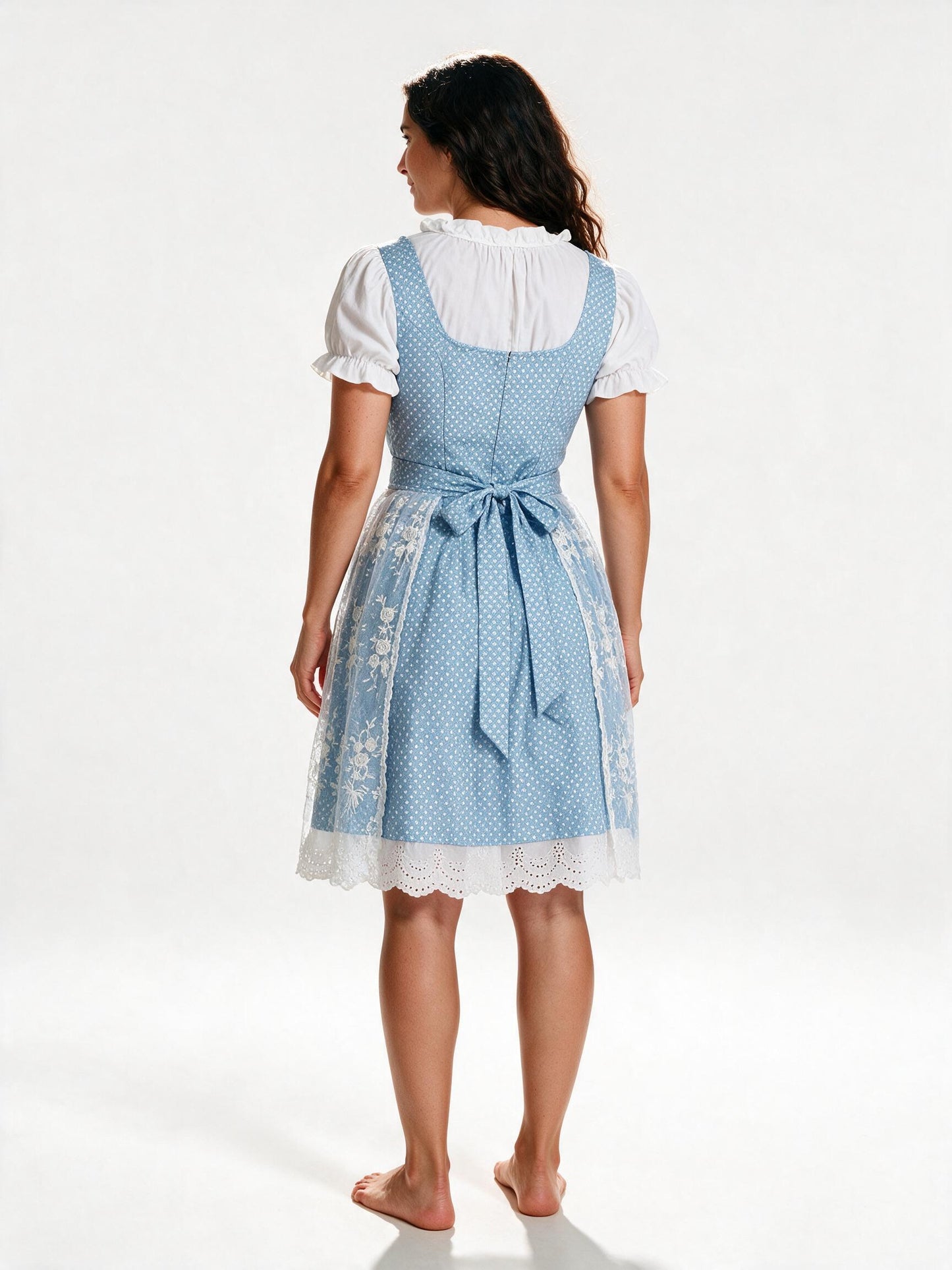 Blue dirndl set, back view showing the apron bow and broderie hem