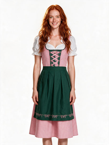Pink check dirndl dress with green apron, front view