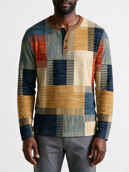 Close view of the patchwork print and the tan three-button placket