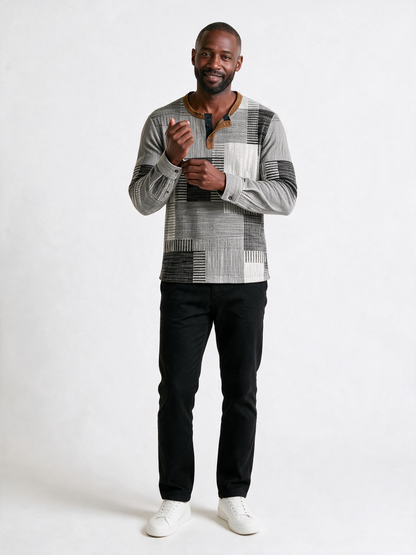 Henrik patchwork print henley in grey, white and black with a tan placket - front view