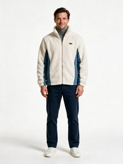Men's sherpa fleece jacket in beige cream with steel blue side panels, front view