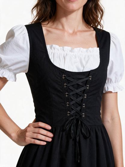 Close detail of the black corset lacing, eyelets and square neckline